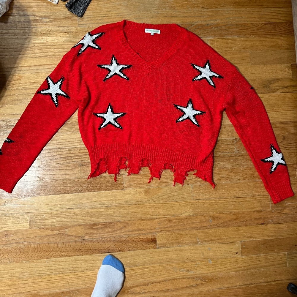 Shop the Mint Oversized Distressed Star Sweater Size L